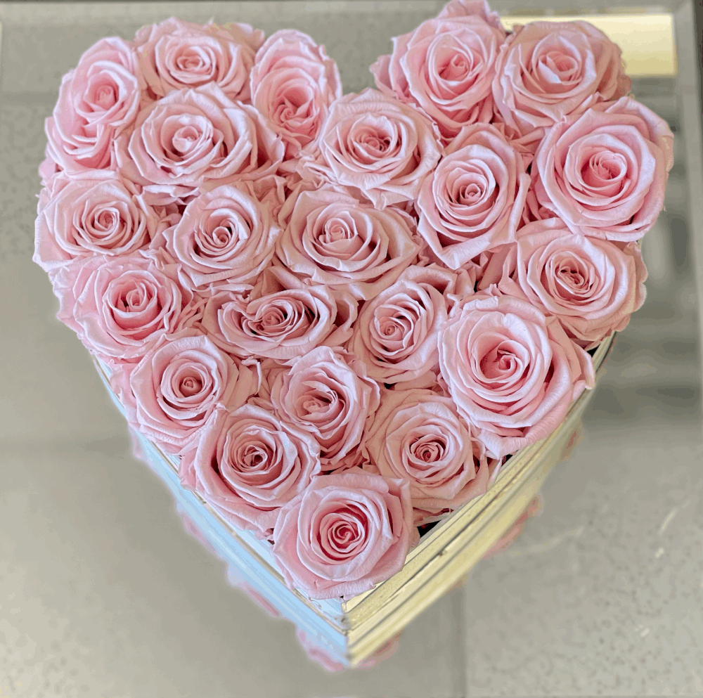 Heart Forever Roses (Pink Roses with White Box) - Forever roses nestle in our Signature Boîte in the shape of a heart that is sure to WOW any recipient. Give the gift that lasts forever!