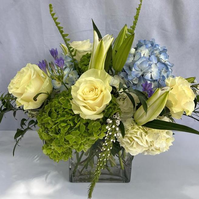 $135-$235 Designer Choice White, Green &amp; Blue English Garden Arrangement - a mix of Premium Flowers! CALL 912.638.7323 TO DISCUSS OPTIONS! - The season, the occasion, the recipient - our talented designers use all elements of your order to create a one-of-a-kind arrangement to the value selected using the fresh premium flowers in our inventory. CALL 912.638.7323 TO DISCUSS OPTIONS!