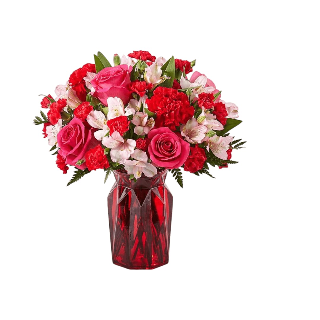 Adore You - Fall in love at first sight with our Adore You Bouquet. Beautifully designed with hot pink roses, red carnations and pink alstroemeria, this flower arrangement is sure to have them blushing all Valentine's Day long! 