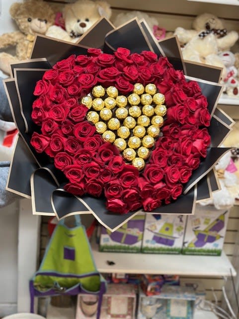 TO MY LOVE BUCHON  - 100 red roses around ferrero rocher heart. Amount of roses will vary depending price point.