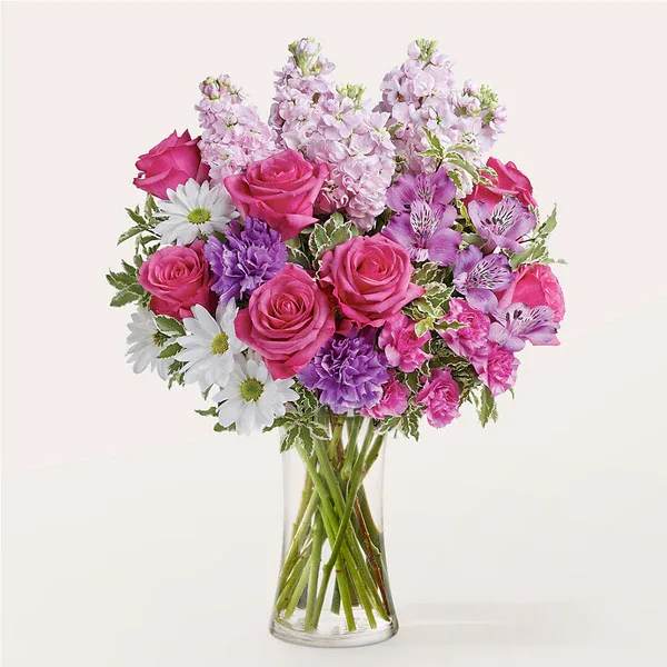 Spa Day Bouquet - Like unwinding at your favorite spa, these gentle florals will gift a moment of respite to those you love most.  Details Designed by florists, ready to display. For long–lasting blooms, replace the water daily. We suggest trimming the stems every couple days. Pet Safety Precautions: This bouquet or plant may include flowers and foliage that are known to be toxic to pets. To keep them safe, be sure to keep this arrangement out of your pet's reach.