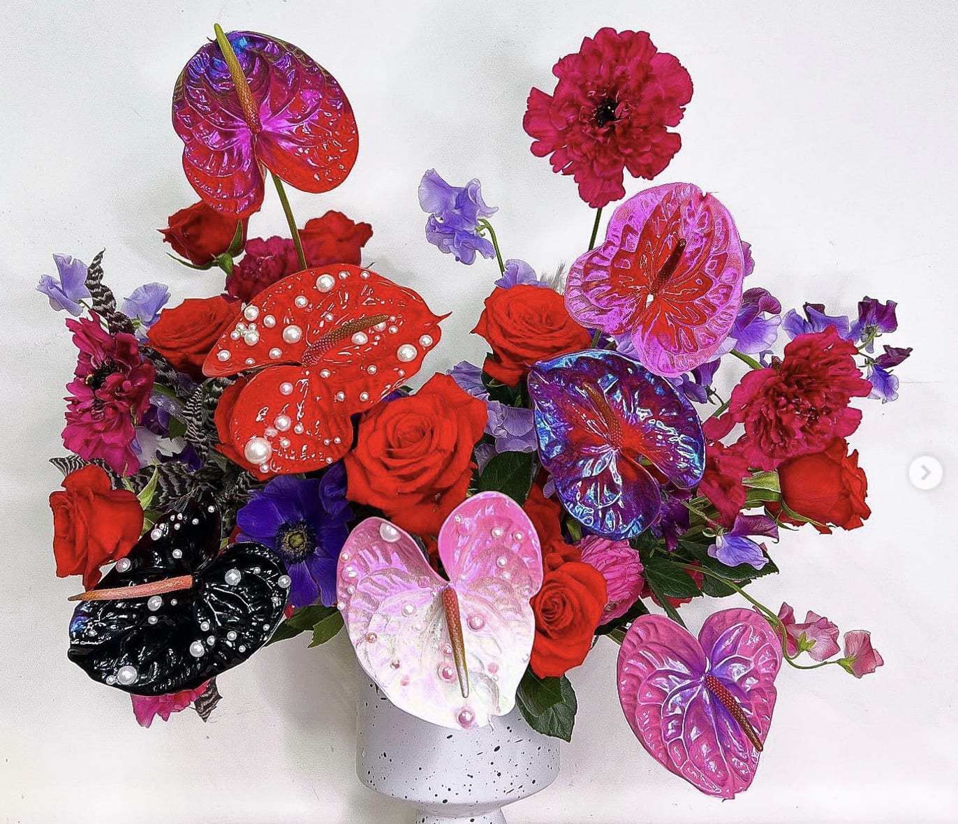 Designers Choice- High Style - These designs will feature Irithiriums from our partners at Haus of Stems.  These unique florals are hand painted and designed to wow!  Standard design will have one stem, Deluxe will feature two complimentary stems and premium will show off 3 of these custom beauties.  If you'd like more than 3, give us a call for pricing options!