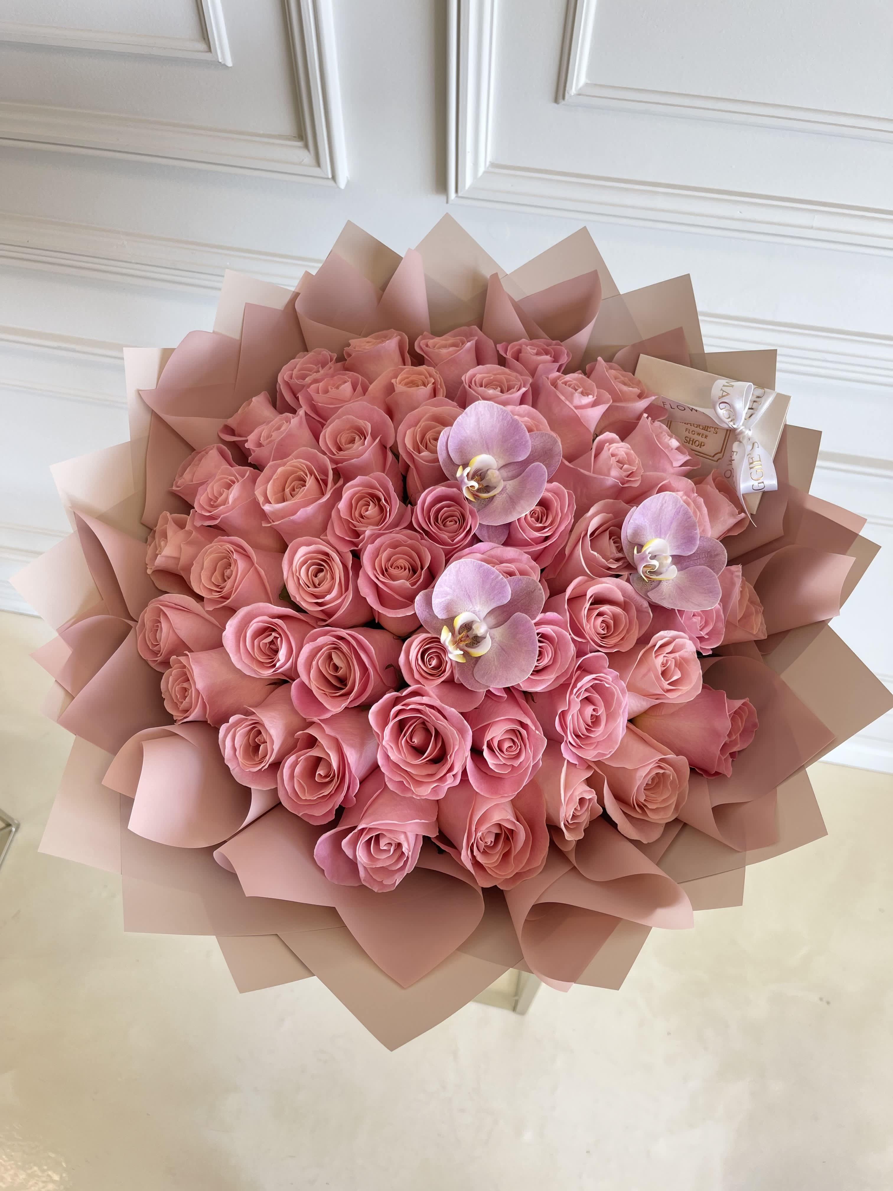 MFS 50 Rose Hermosa Bouquet (Orchids)  - Signature hand-tied rose bouquet  50 Hermosa Pink Roses  Orchids   *This bouquet does not include a glass vase  #170