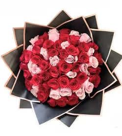 Scarlet Pink - A delicate mix of red and pink roses, wrapped in an elegant paper 