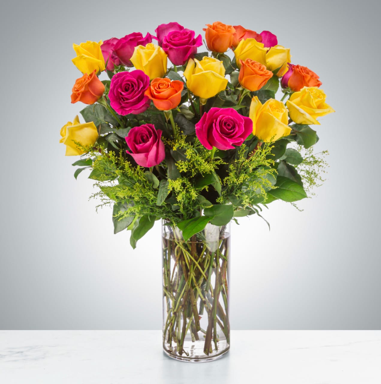 The Sound of Joy (24 Roses) - Send an explosion of color with this long-stemmed rose arrangement perfect for celebrations or showing your appreciation. A great alternative to the classic red rose, send a giant arrangement of 24 multicolored bright roses.  Approximate Dimensions: 20''D x 28""H