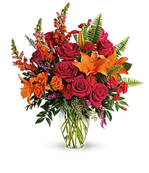 Touch of Color - Bold color. Roses and lilies. Wow! This arrangement makes a statement!