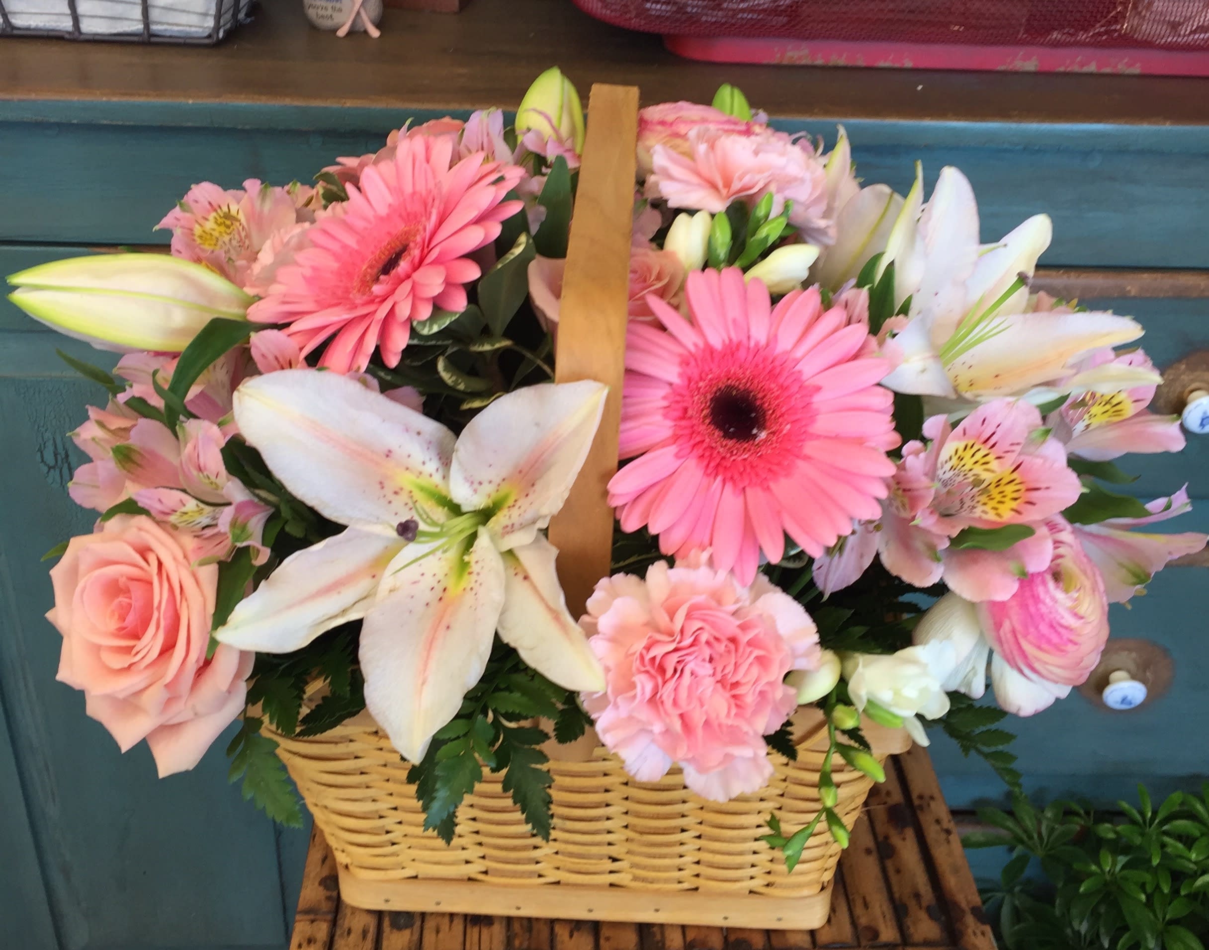 Pretty Pinks - A lovely arrangement in shades of pink with a touch of white.  Flowers include gerber, roses, lilies, and more! Just beautiful.