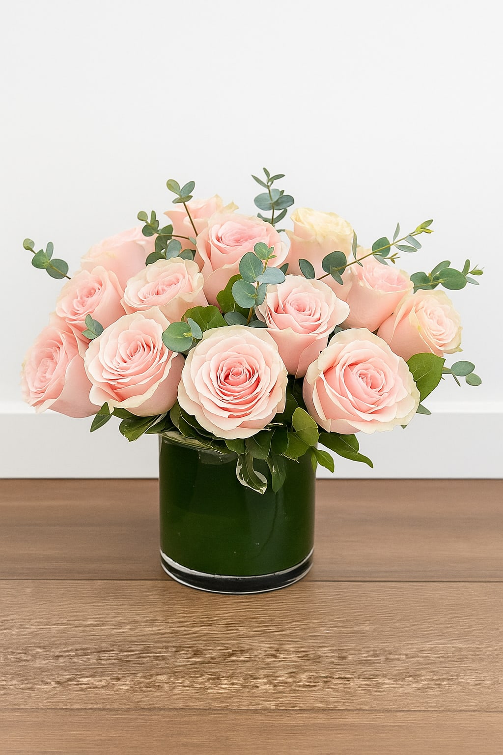  Pink Rose Cylinder - Pink Rose Cylinder – Classic Elegance in Blush  Simple, chic, and timeless — Pink Rose Cylinder features soft blush roses beautifully arranged in a modern green glass vase. This elegant design highlights the natural beauty of premium roses and lush greenery, making it perfect for anniversaries, birthdays, or everyday luxury. Handcrafted by Polk Street Florist in San Francisco, this bouquet brings effortless sophistication to any setting.