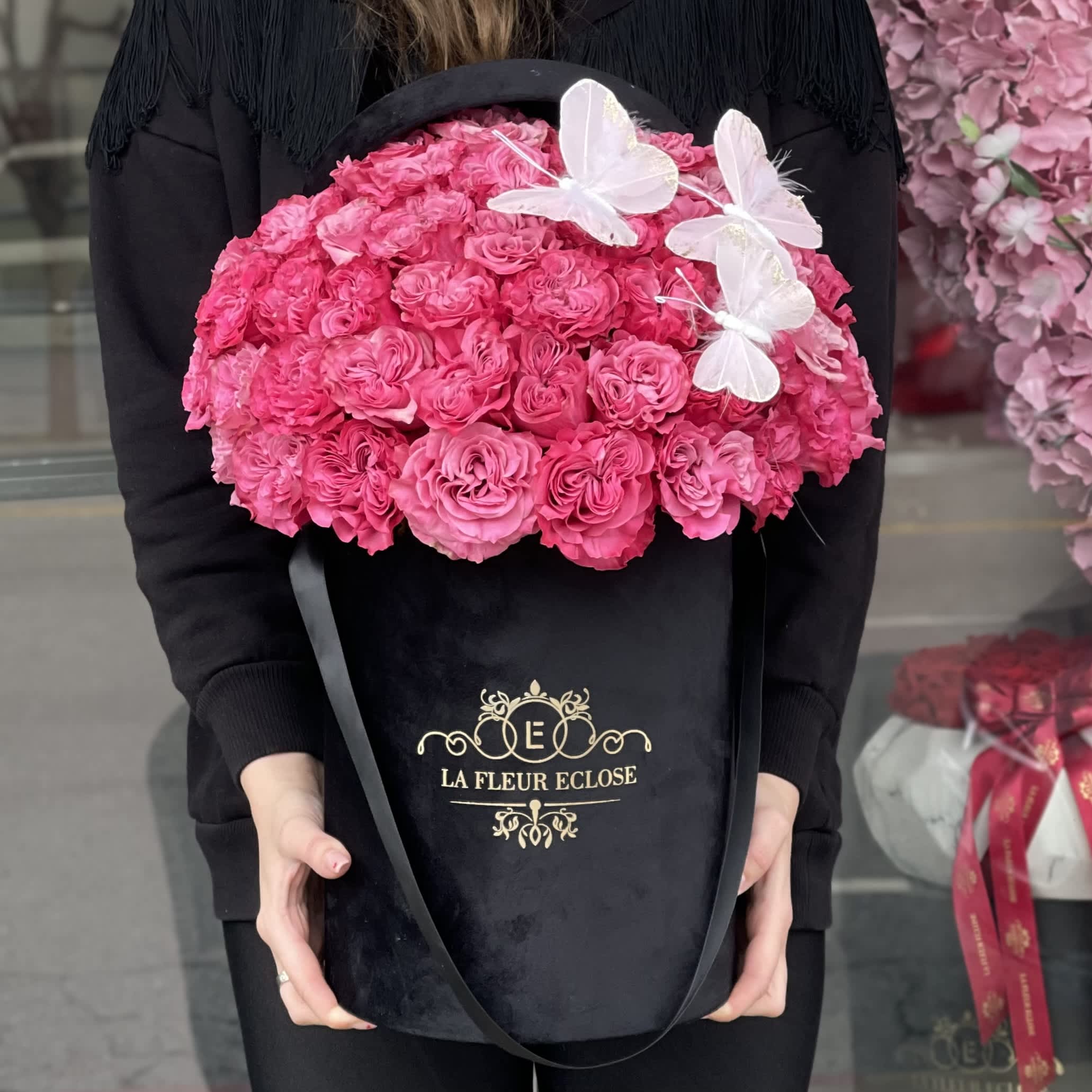 Heart shaped symphony  - 75 heart shape pink roses in a black velvet box with the butterflies on the top