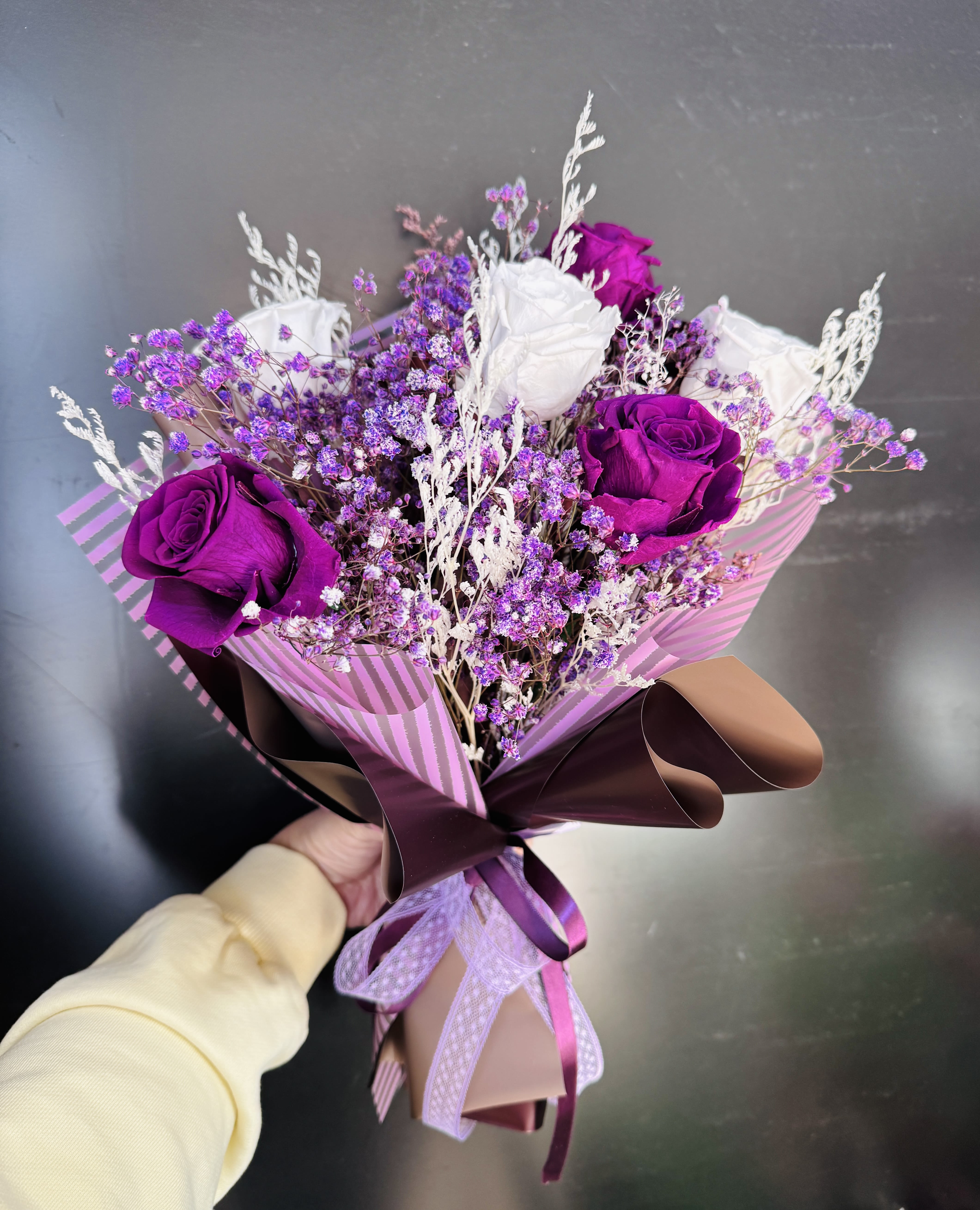 1/2dz purple  preserved rose bouquet - 6 assorted purple and white preserved roses with purple preserved baby's breath and fillers