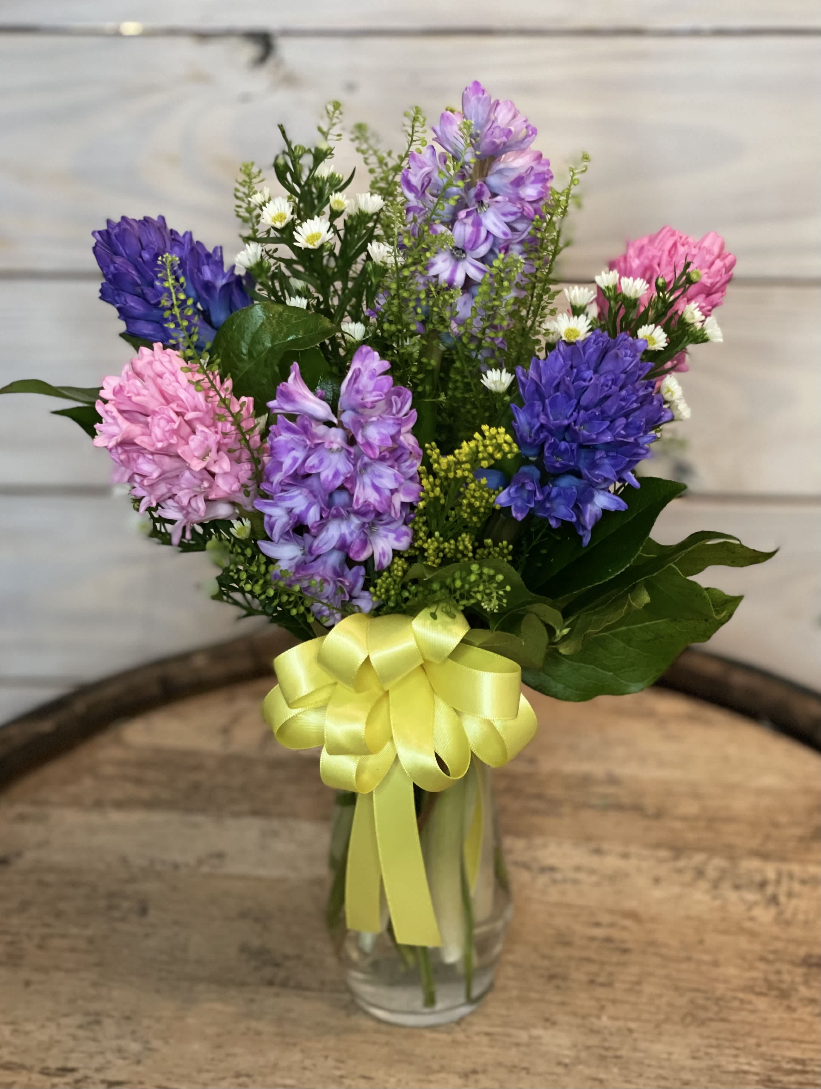 Fleeting Fragrance of Spring - 6 colorful stems of hyacinth in a small vase with filler flowers.  Note! ***These flowers are very fragrant*** 