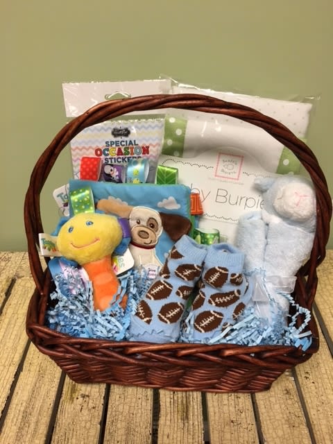 Welcome Baby Boy GS01 - Welcome your new little man with this gift filled with unique baby specialty items from our children's boutique. Gifts will be chosen with care by our Rhoads Buds crew. Items may vary based on availability. Local deliveries only.