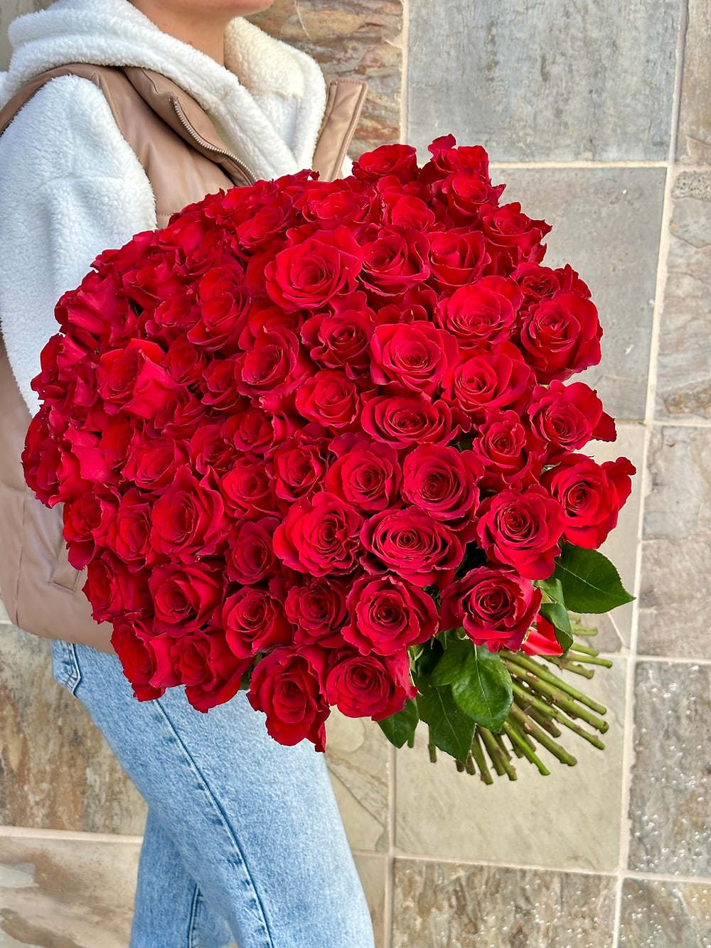 72 Long Stemmed Red Roses - Huge round bouquet of roses instead of 1000 words. Classic yet gorgeous.  Arrangement includes: - Fresh premium Ecuadorian roses. - Blushing Louis original wrapping. - Custom greeting card. - Flower food packages.
