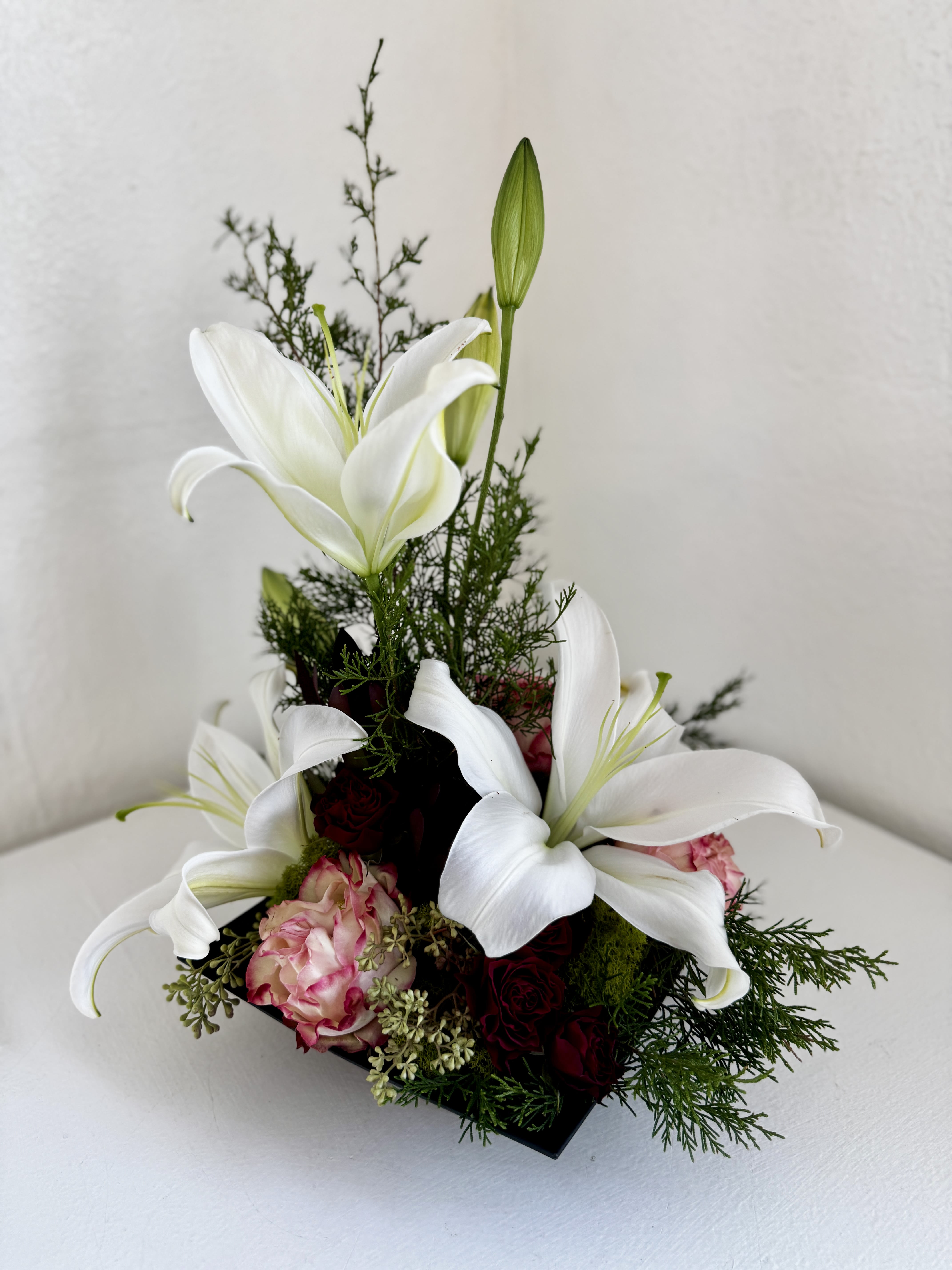 Artistic Elegance - A modern, contemporary arrangement using fresh, in season blooms to accommodate a gorgeous artistic and elegant display of flowers!