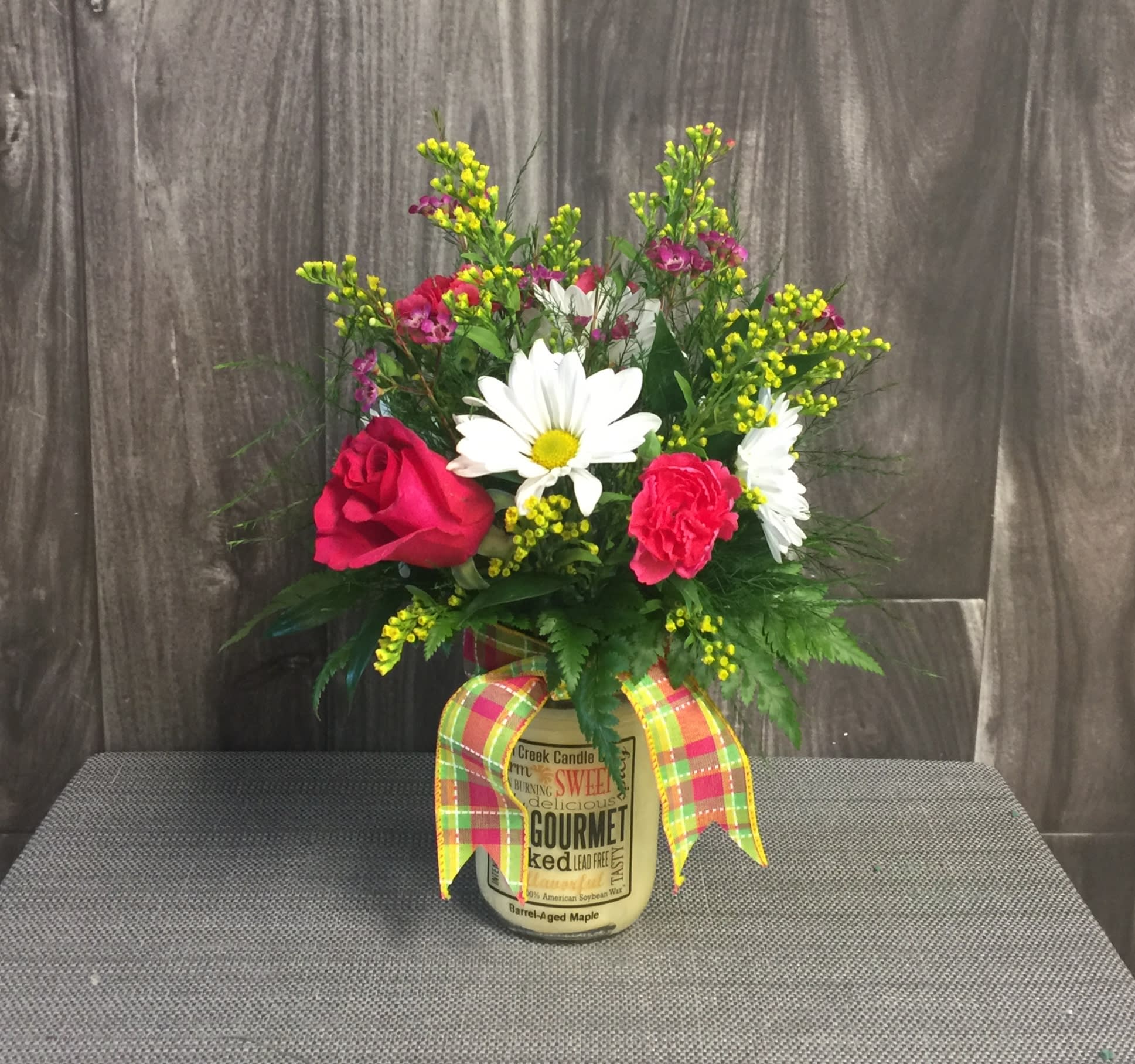 Flowers &amp; Scents - Send this lovely arrangement of season blooms with a candle to keep and enjoy!