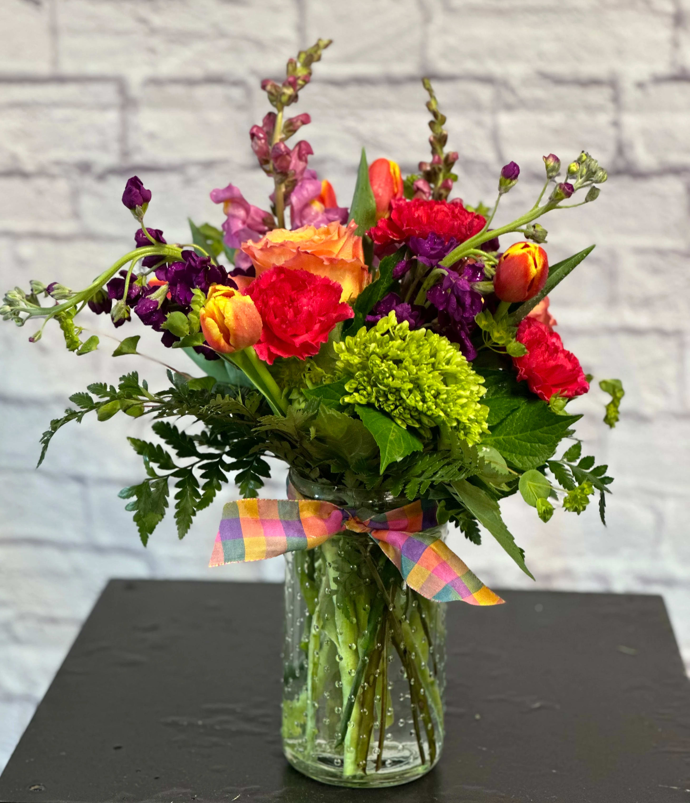 Floral Fancy - Sending a beautiful arrangement of brightly colored bloomswill convey exactly what you're feeling!
