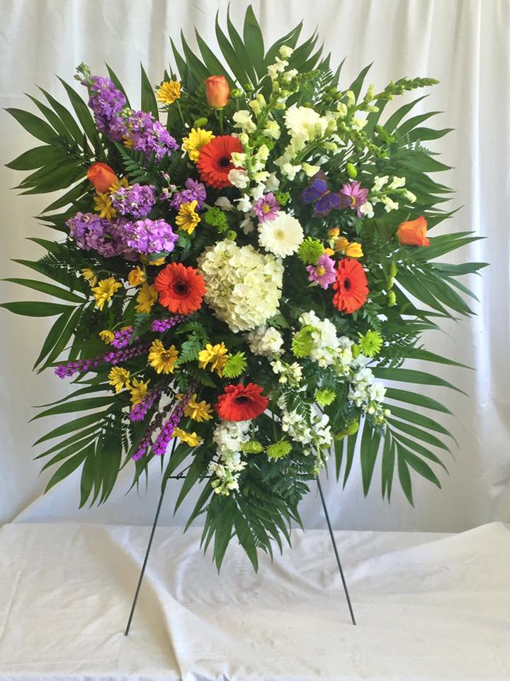 Sweet Remembrance Spray - The flowing, improvisational feeling expressed by this beautiful spray of pastel flowers is like an outpouring of love. It will be long-remembered. 
