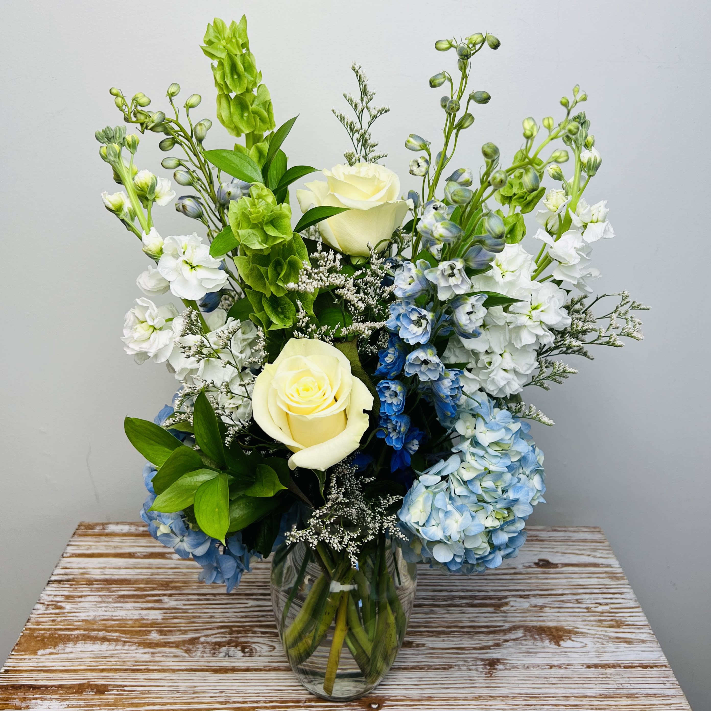 Breezy by the Sea - Giving off seaside beach vibes, our Breezy by the Sea is a great gift for a birthday, get well, for wishing someone a fresh start.  Approximately 16" Tall