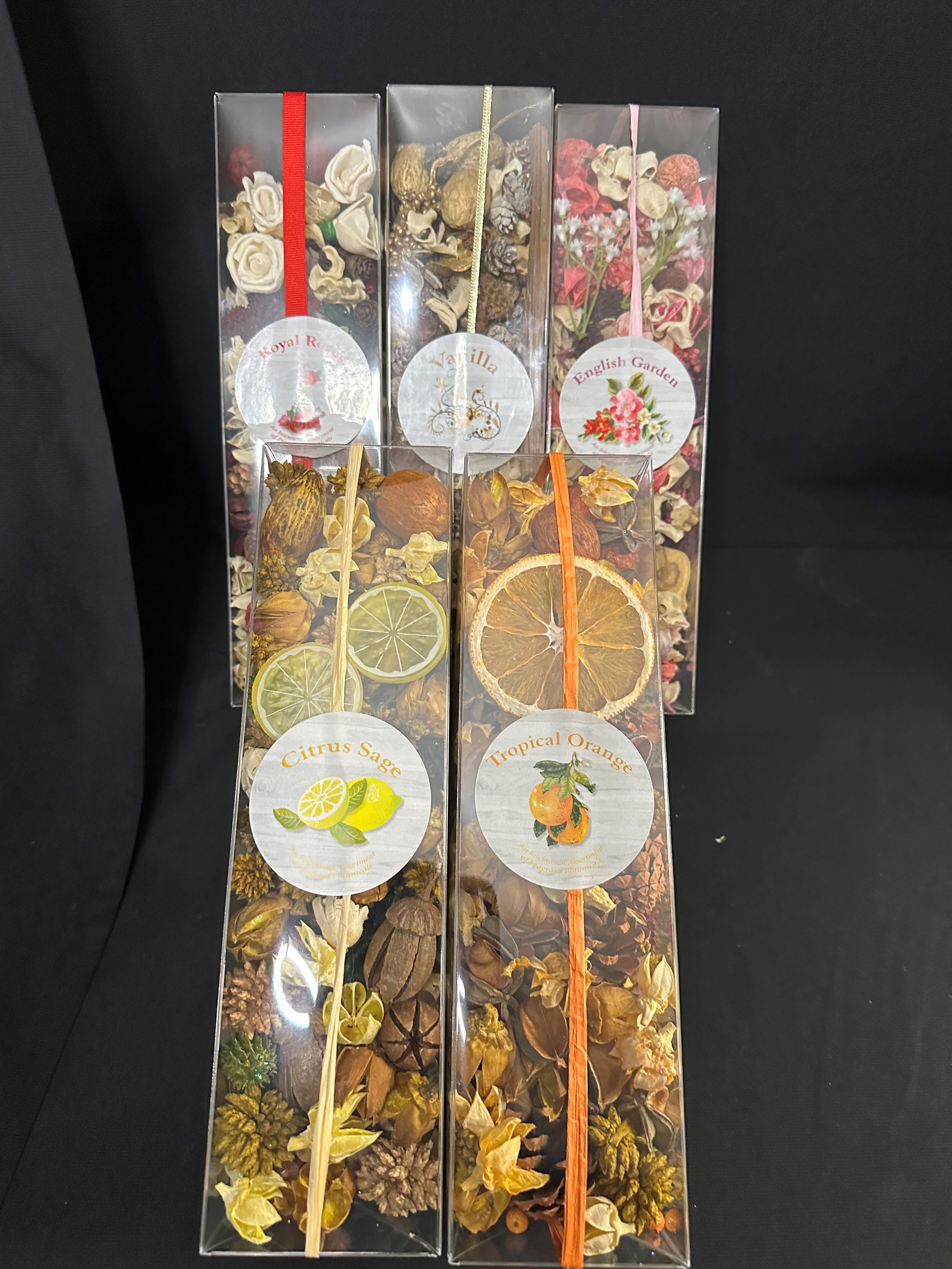 Potpourri - Elevate your space with our beautifully curated Scented Potpourri Collection, offering an array of captivating fragrances to match any mood or season. Each elegantly packaged potpourri blend is infused with delightful scents like Royal Rose, Vanilla Bliss, English Garden, Citrus Sage, and Tropical Orange. Perfect for freshening up your home, office, or as a thoughtful gift, this collection combines natural botanicals with enchanting aromas to create a serene and inviting atmosphere.