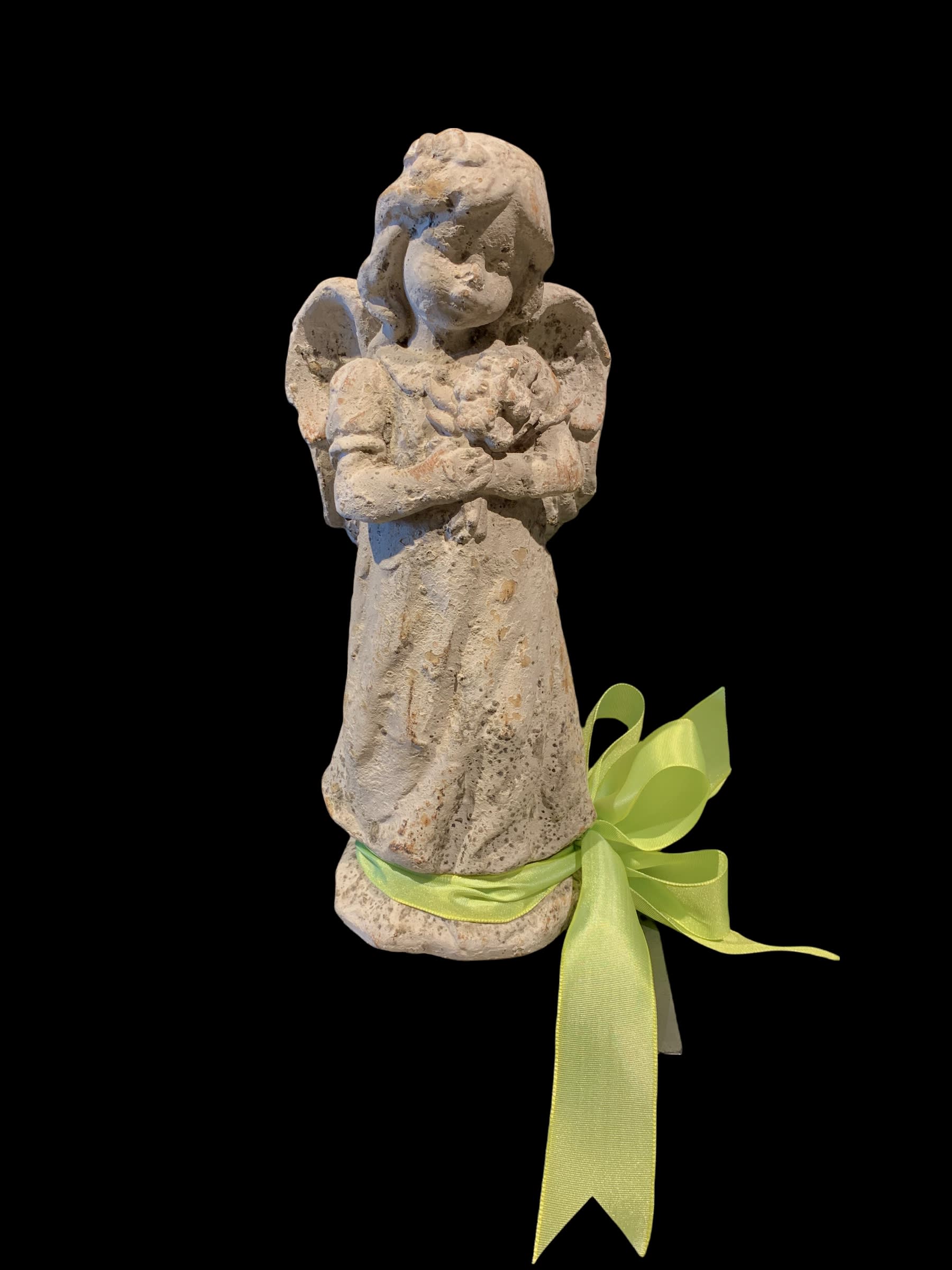 Aged Stone like Angel with flowers - Sweet aged concrete angel holding a sweet bouquet in it's hands. Sweet memorial for the loved one in your life. Perfect for home, garden or screened porch. Approx 13x5.5 Delivered as seen with a bow and your card with sentiment tied to it.
