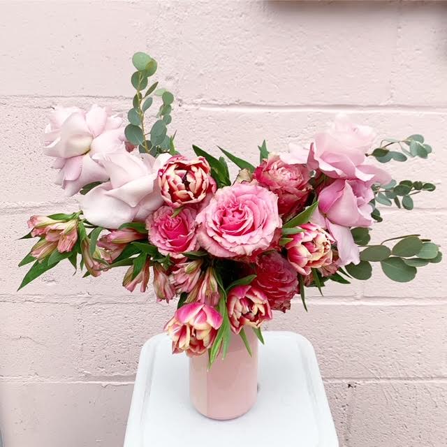 The Juliette - Surprise your sweetie with this pink flower goodness that lightly resembles a heart! Gorgeous garden roses with double blooming tulips and pale pastel secret garden roses make up this beauty.
