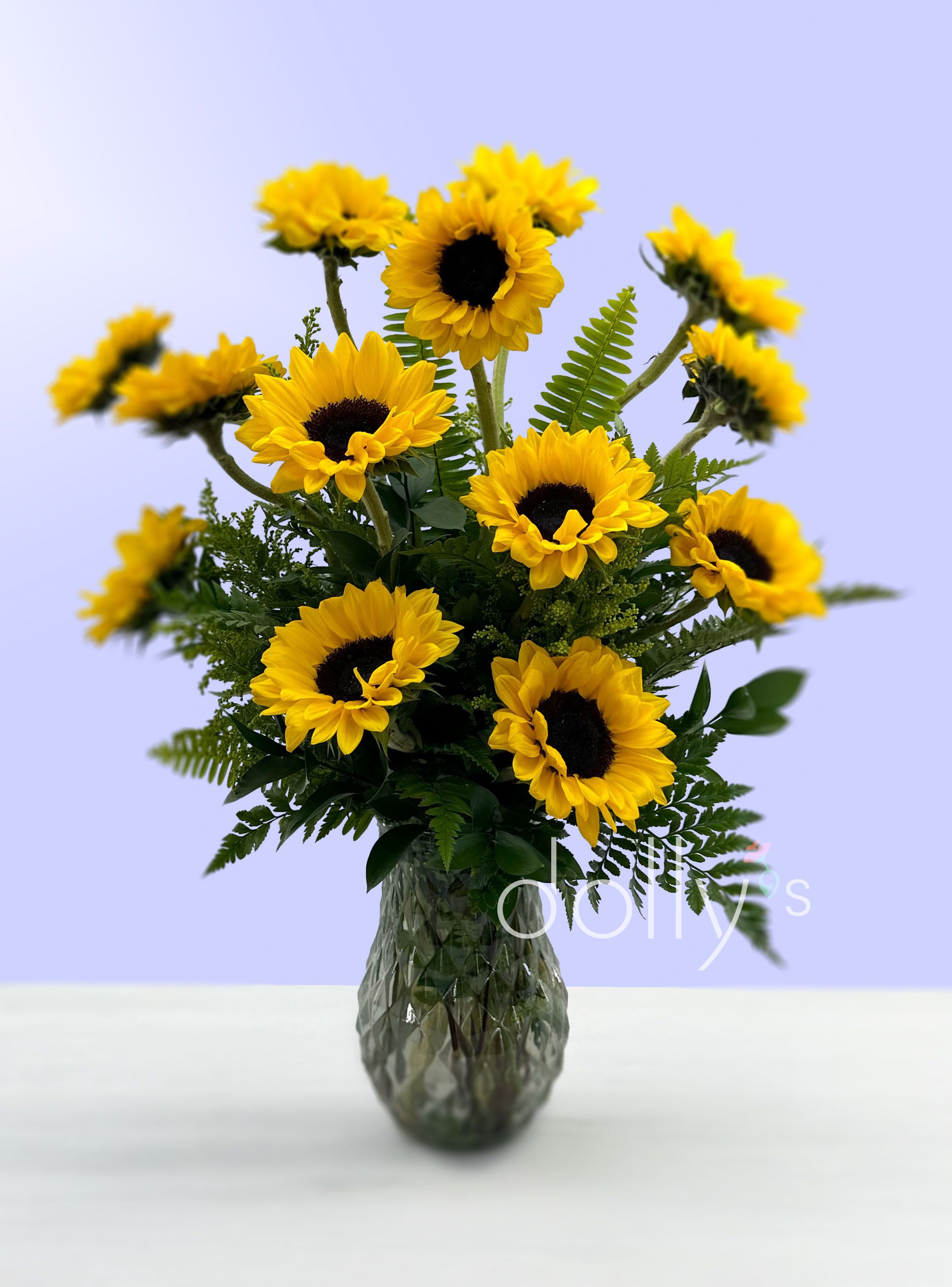 Dozen Sunflower Vase Bouquet  - 12 Sunflowers arranged in a large glass vase. 
