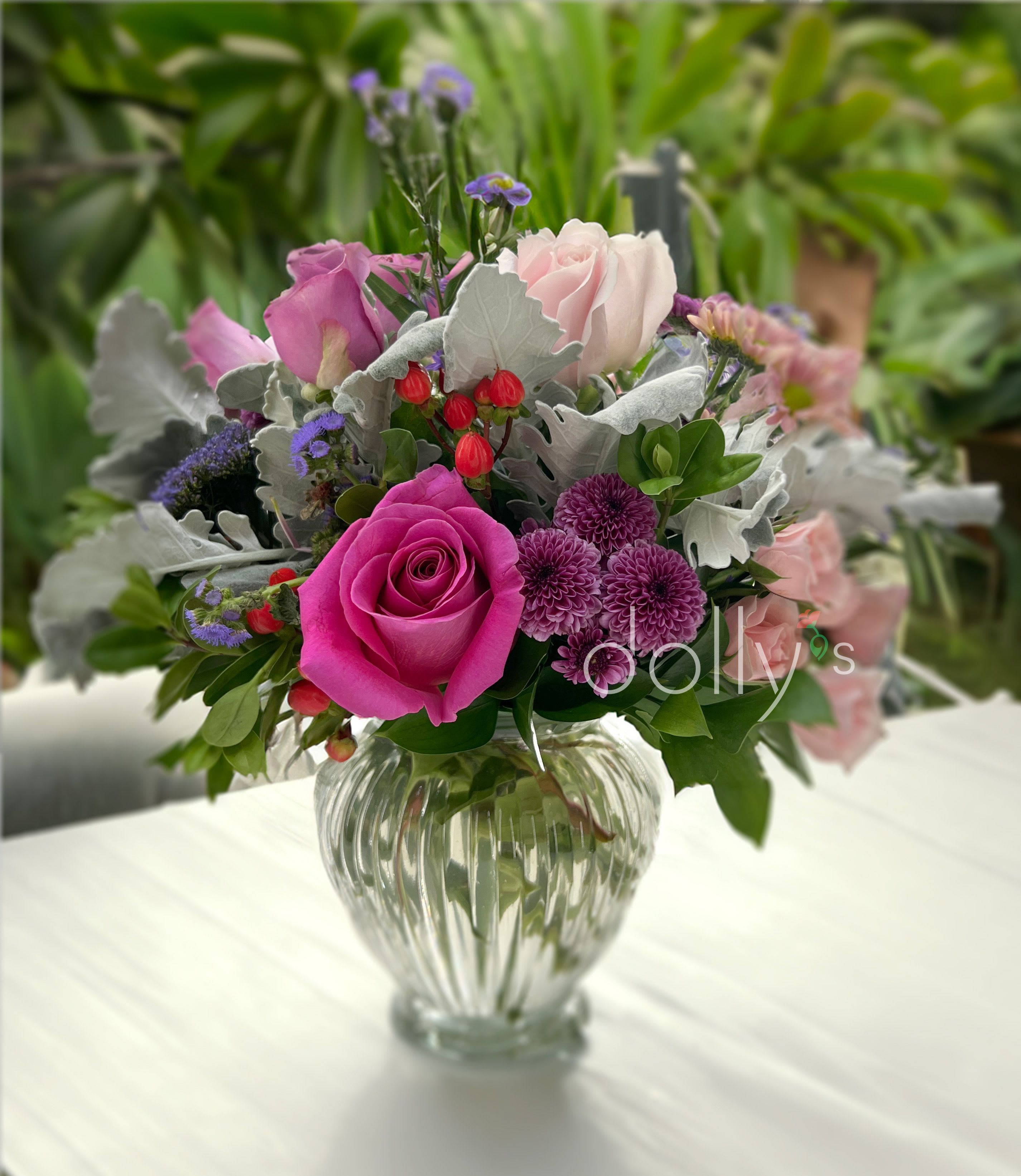 Low-Key Hues  - Soft colored mixed bouquet.