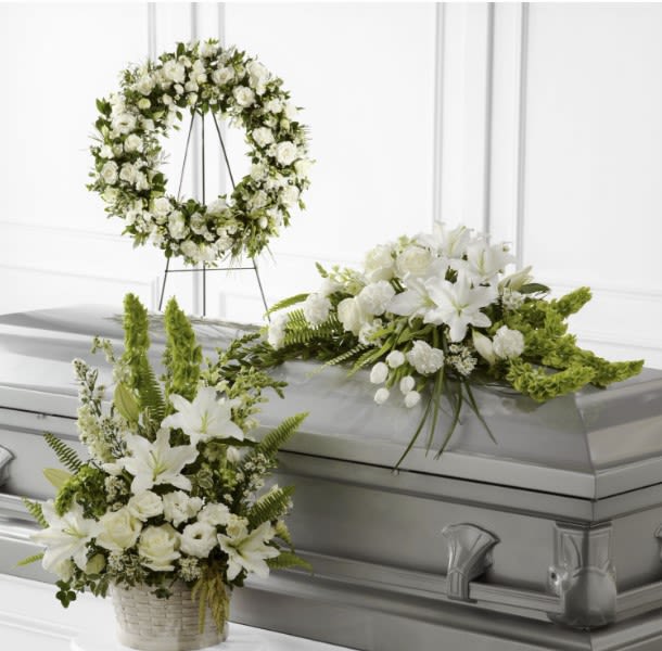 Serenity Tribute Trio - The serenity tribute trio package Includes: Flower basket, Casket Spray, and round wreath. The colors and flowers can be adjusted as you prefer. Please leave us your changes requests in the notes section and we will try our best to accommodate to them. 