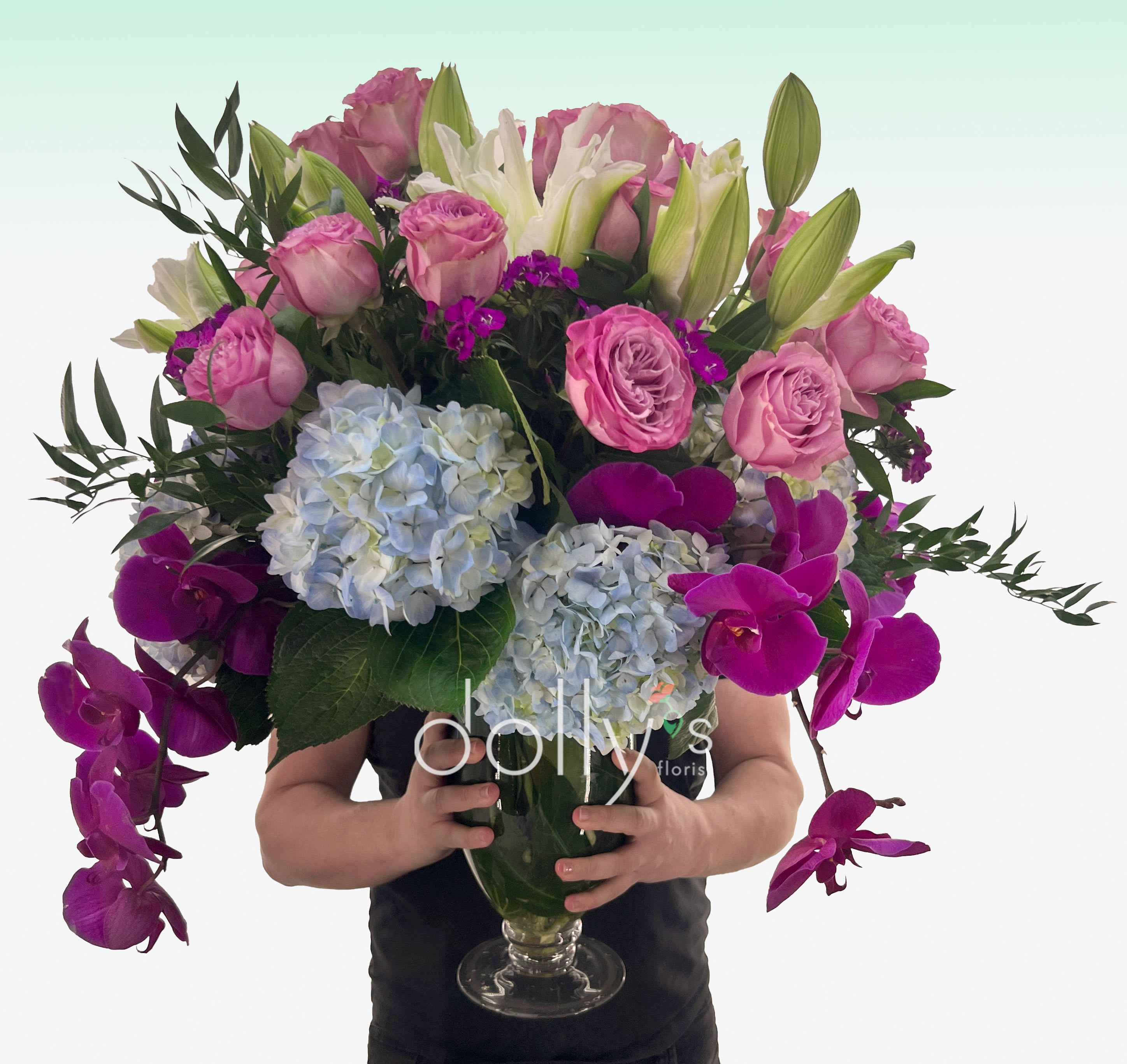 Quiet Opulence  - Featuring deep purple orchids, soft blue hydrangeas, and heirloom roses