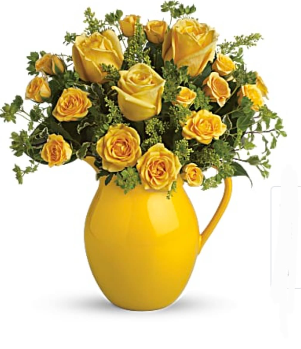 Beautifull yello jug - Elegant yellow jug with yellow roses and warm foliage forming a beautiful detail for that special occasion.
