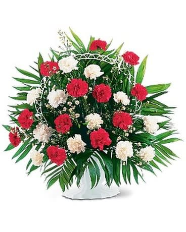 HOPE AND HONOR BASKET - This arrangement with its red and white carnations honors friends and loved ones with classic style. One arrangement arrives with a classic mixture of red and white carnations in a traditional white funeral basket.  Approximately 28" W x 33" H