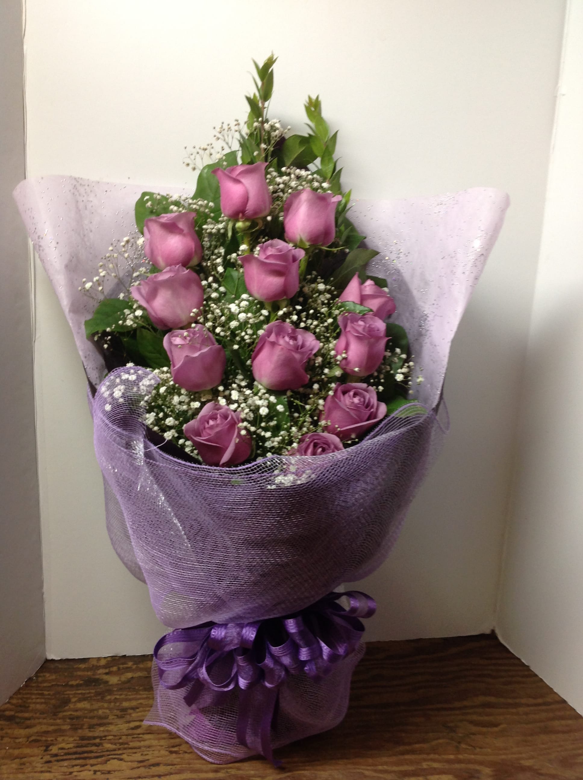 Love and Romance #8 - A beautiful display of flowers wrapped in the Hong Kong style. Colors and variety may change. Please call for details.