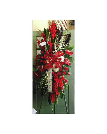 SYMPATHY SPRAY - SYM-060 - A beautiful standing spray in reds and whites - gladiolus, anthurium, roses, orchids and hydrangea.   **Price does not include a printed banner.
