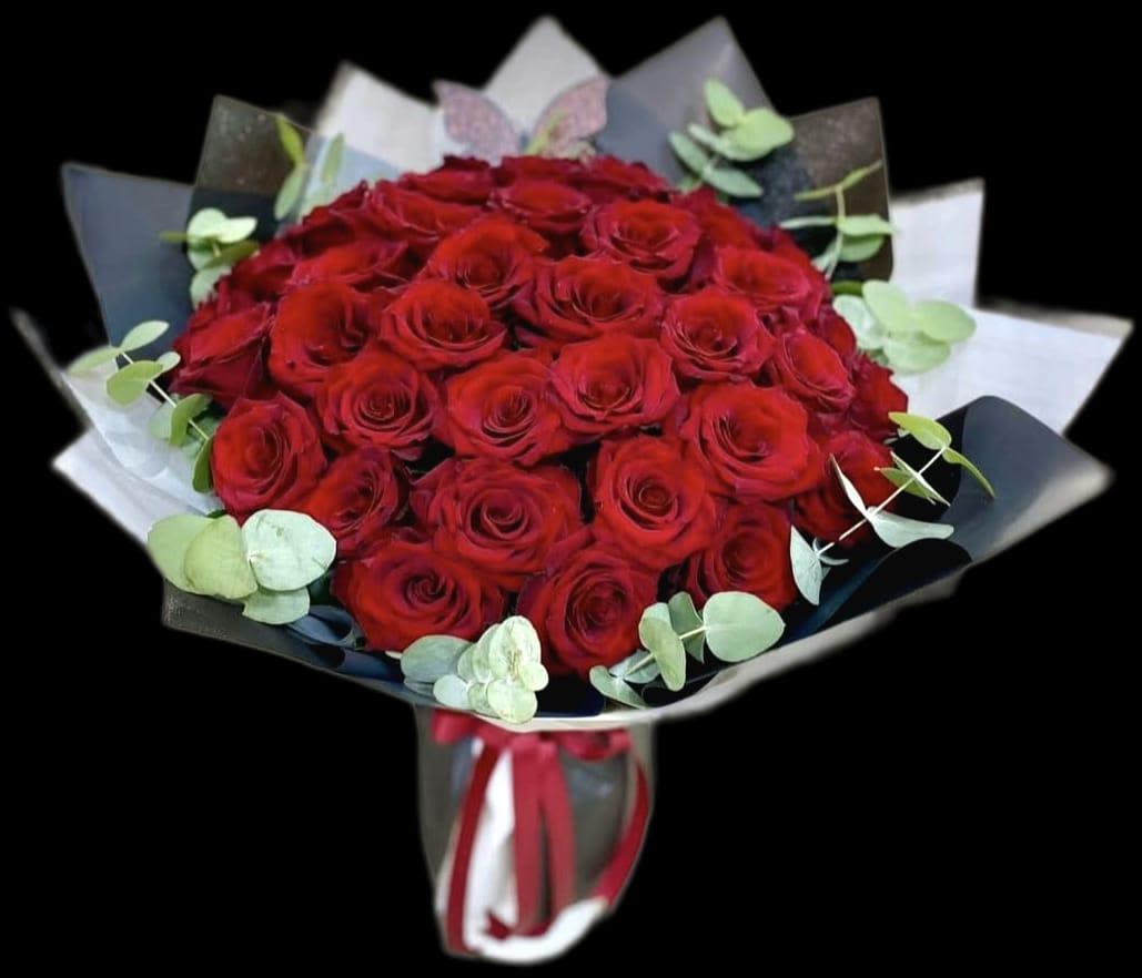 LUCIA - A beautiful bouquet of red roses, adorned with Korean paper and tied with a lovely ribbon. Ready to melt the heart of your loved one.