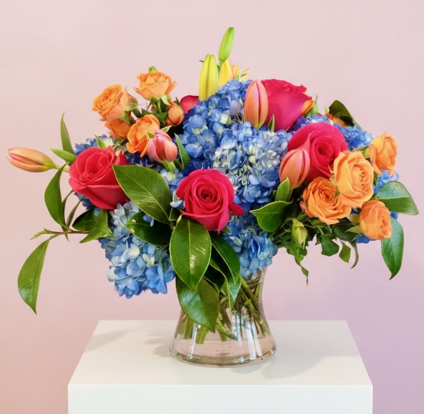 Bright Designers Choice - Trust our designers to create a beautiful bright arranging with the prettiest brightly colored flowers in our cooler.  This photo is just an example, exact design will vary