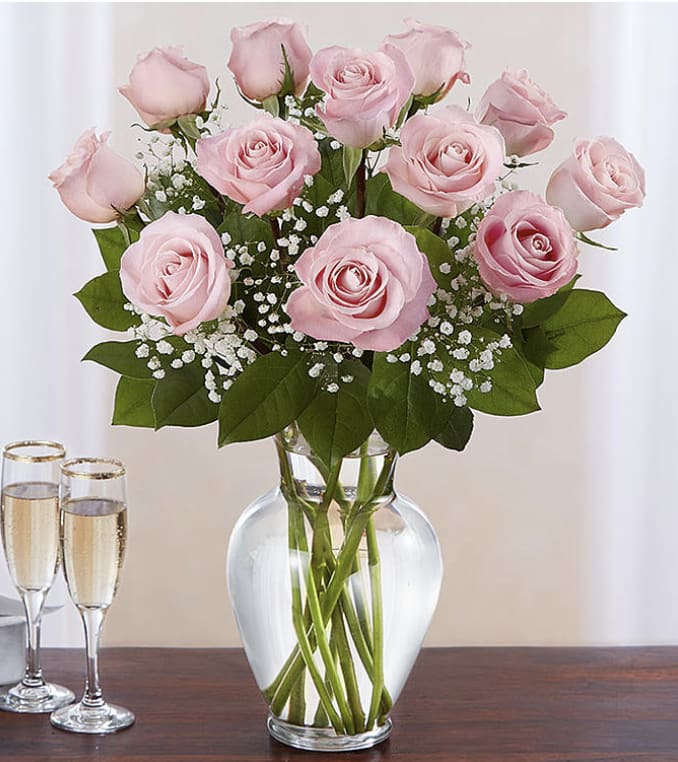 Dozen Long Stemmed Pink Roses - These pink roses are cheerful and fun! Dozen Long Stemmed Pink Roses by BloomNation™ is the perfect gift to show your love and appreciation.