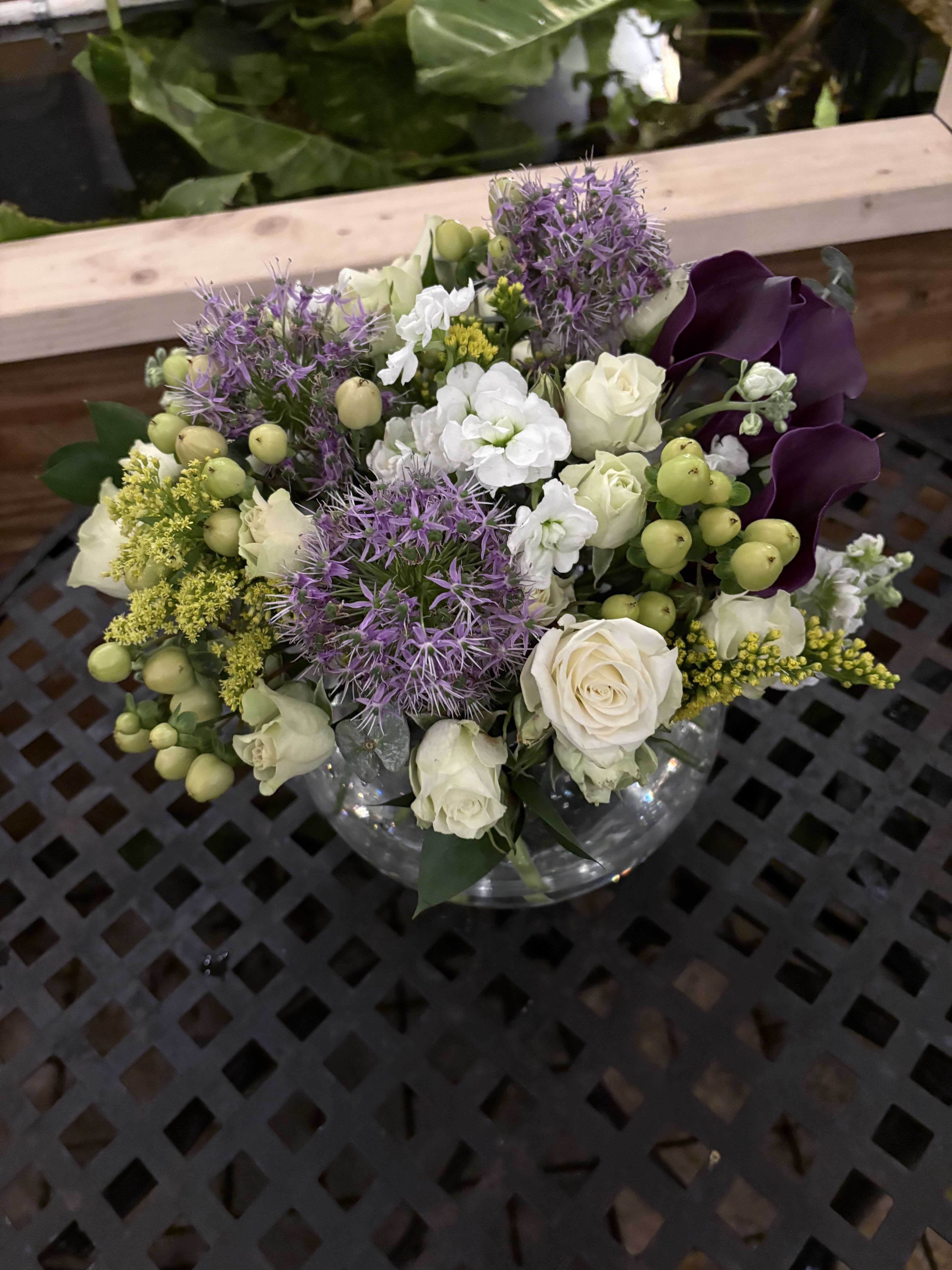 Luminous Bliss - This arrangement brings a touch of joy and tranquility, ideal for any joyful celebration or peaceful retreat.