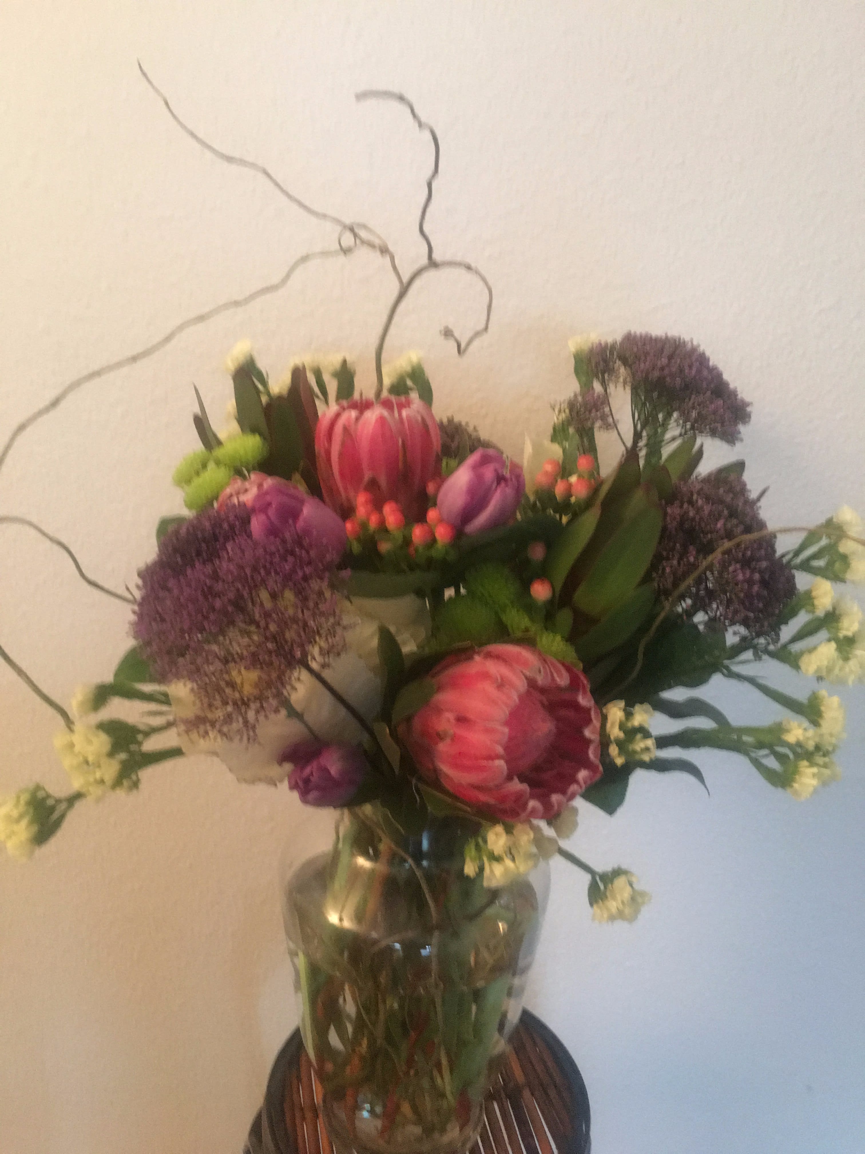 Protea Fancy - Tropical arrangement with pink mink proteas,pink hypericum berries,trichilium.