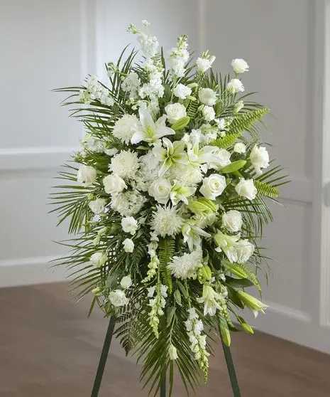 Mi Angel (standing spray) - All white standing spray perfect to honor your loved one and remember them with beautiful flowers 