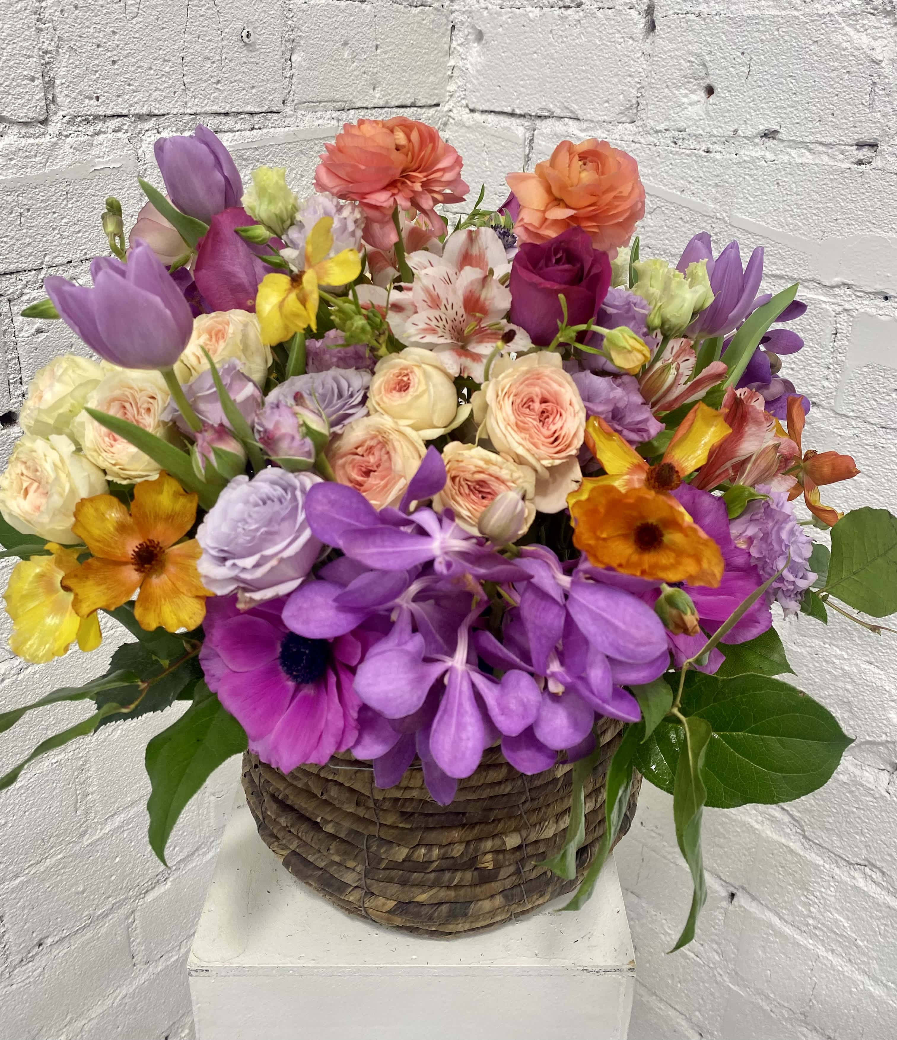 All my Love in a Basket  - Bright and bold mix of colors and flowers in a beautiful natural basket.