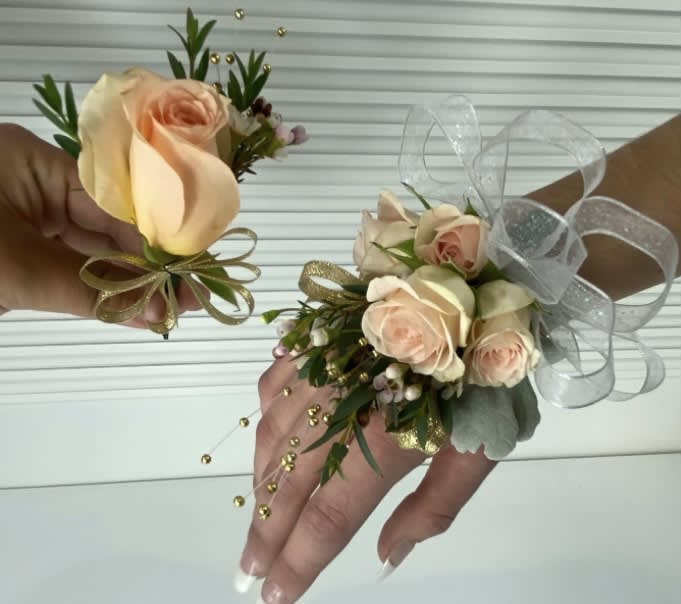 Peach and white corsage &amp; Boutonnière  - Peach spray roses, white ribbons and gold accents. 