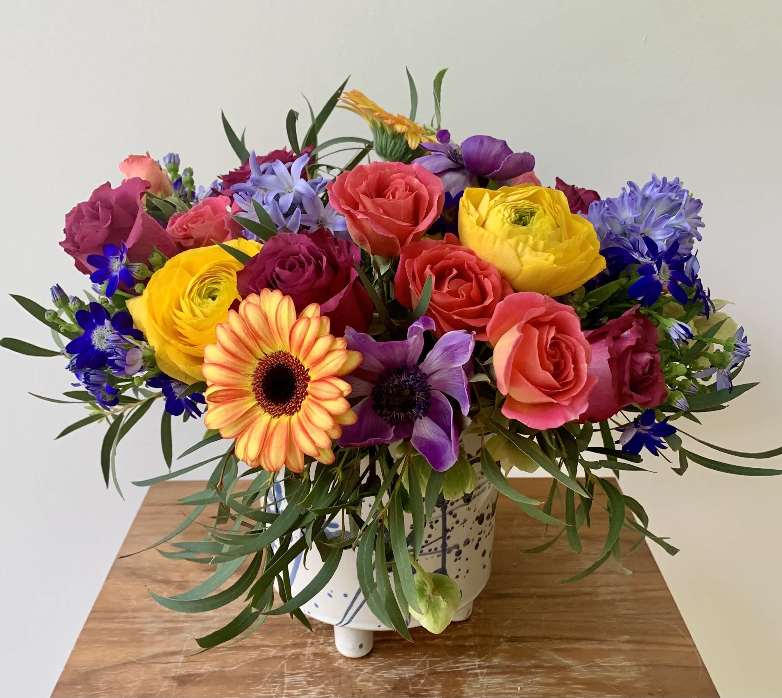 Spread Love with Pride - Especially for the month of June, I am offering a lovely flower arrangement to celebrate love, respect, tolerance for and inclusion of LGBTQ community. I select premium flowers based on the availability to create a vibrant happy flower arrangement in a ceramic vase.