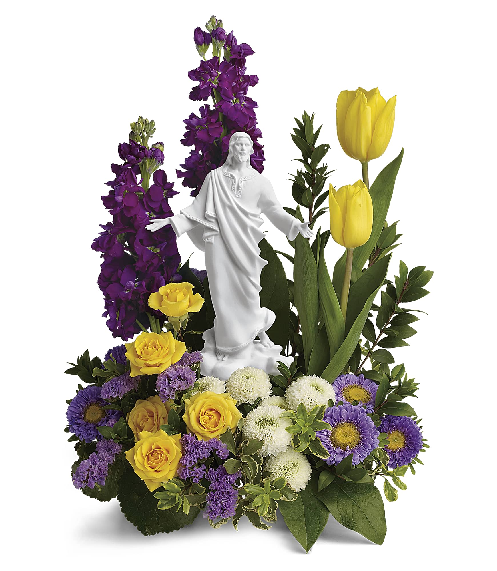 Sacred Grace Bouquet - Bring a radiant reverence to any spring occasion with this yellow and purple bouquet of roses, tulips and asters surrounding a peaceful porcelain keepsake statue.