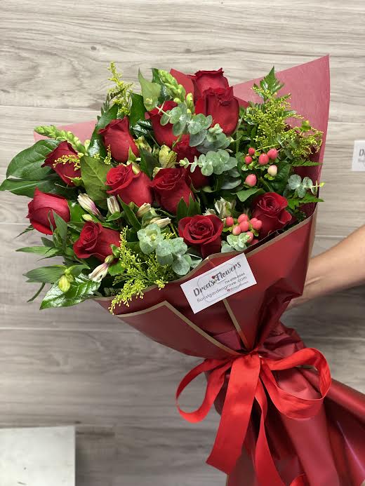 Just For You  - Our just for you red rose bouquet mix. Handheld bouquet , you may request certain color wrap, no vase included. Call to request vase if needed. 