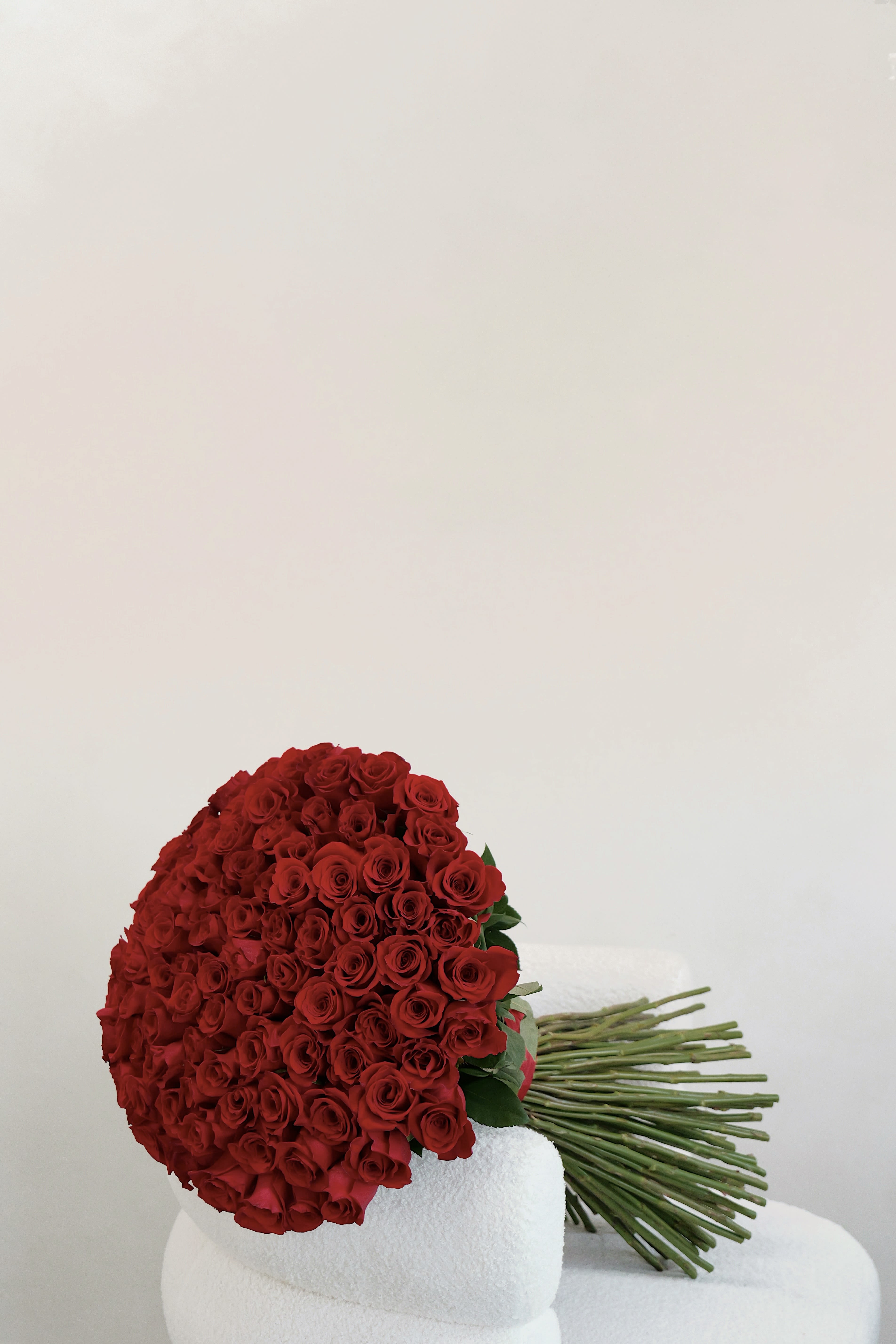 100 Long Stem Red Rose Bouquet  - Make an unforgettable statement with 100 stunning red roses. This grand bouquet represents endless love and passion, carefully arranged with the freshest premium blooms for maximum impact. Perfect for expressing deep emotions, celebrating milestones, or creating a once-in-a-lifetime moment.