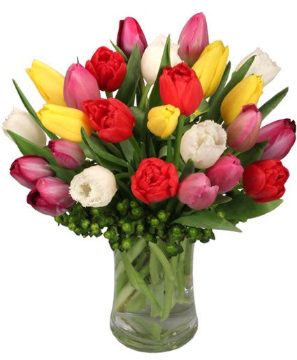 TIP TOP TULIPS BOUQUET  - This vibrant bouquet is sure to dazzle! The marvelous tulips create an intoxicating rainbow, mesmerizing everyone who sees them. Impeccable and grand, Tip Top Tulips is a radiant mix, bursting with color and perfect for any occasion! Send this ravishing bouquet today! 