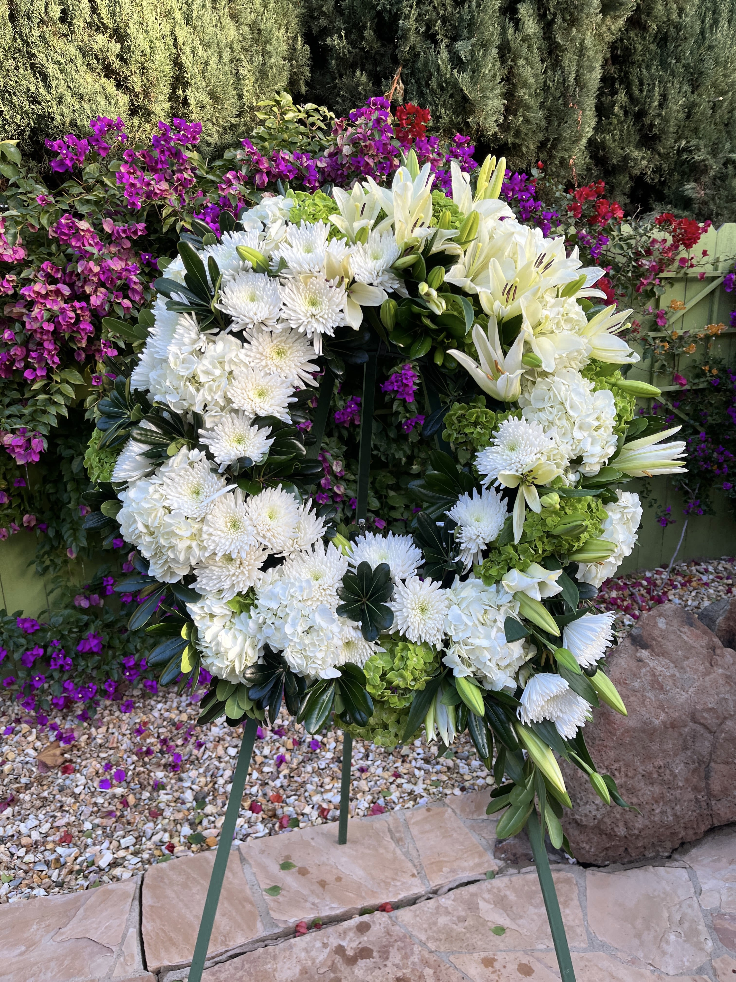 Lasting Serenity  - The photograph is an illustration of one example of this style of arrangement. The arrangement delivered will be designed based on the season and availability of specific flowers. If you would like to request certain flower types and colors, or have other design considerations, please place your order in the Custom Arrangements section where you can specify those details or give us a call to discuss your ideas.