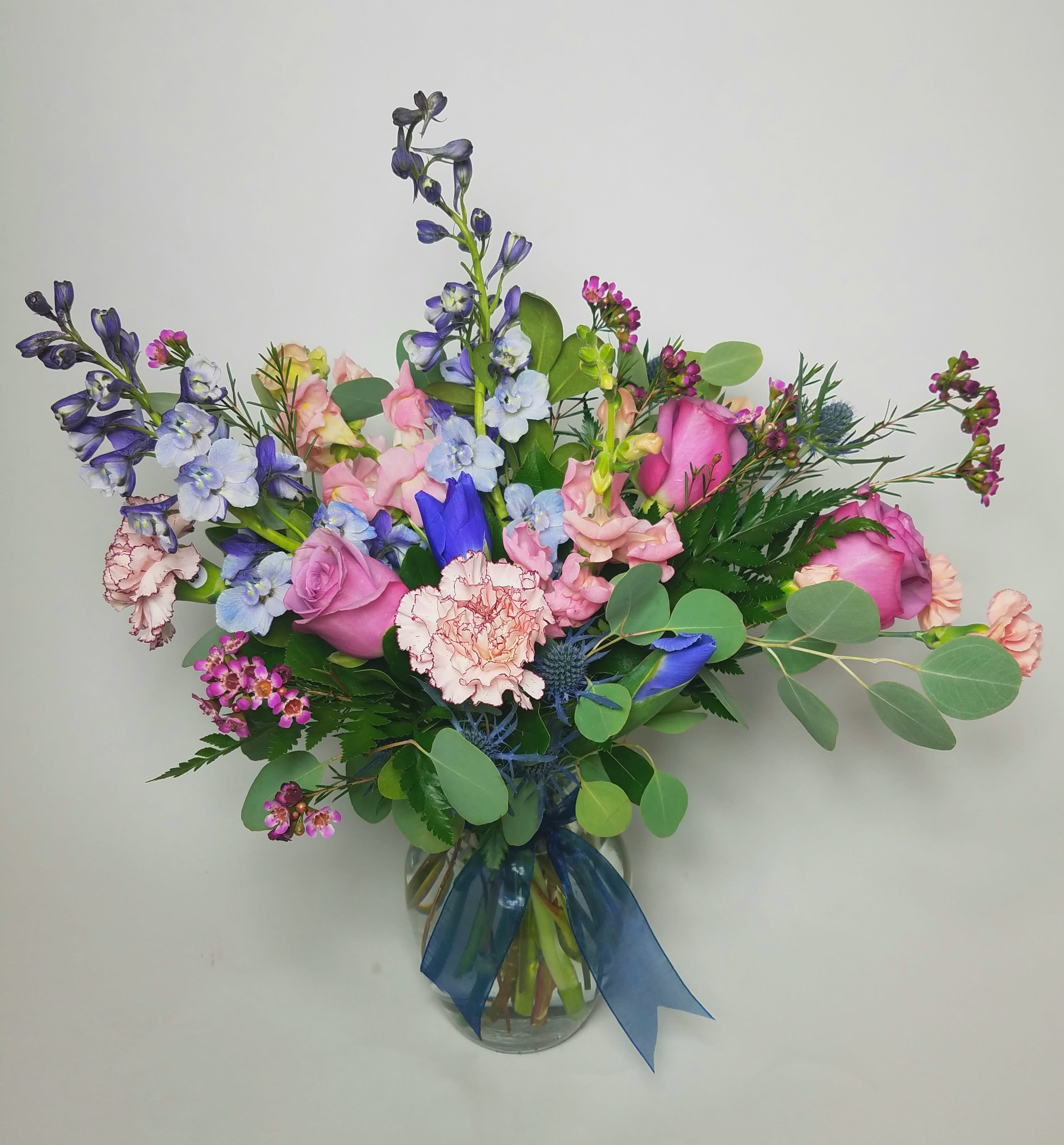 Berry Smoothie - A mix of all the vibrant berry colors that we love and depend on season after season. This arrangement is bright and sweet as can be!