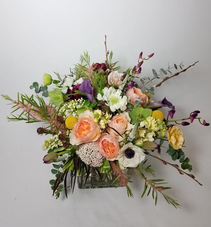 Vanilla Almond Latte - Romantic and lush is what comes to mind with this sweetly colored design. filled with unique and memorable blooms this gift will make anyone swoon! 