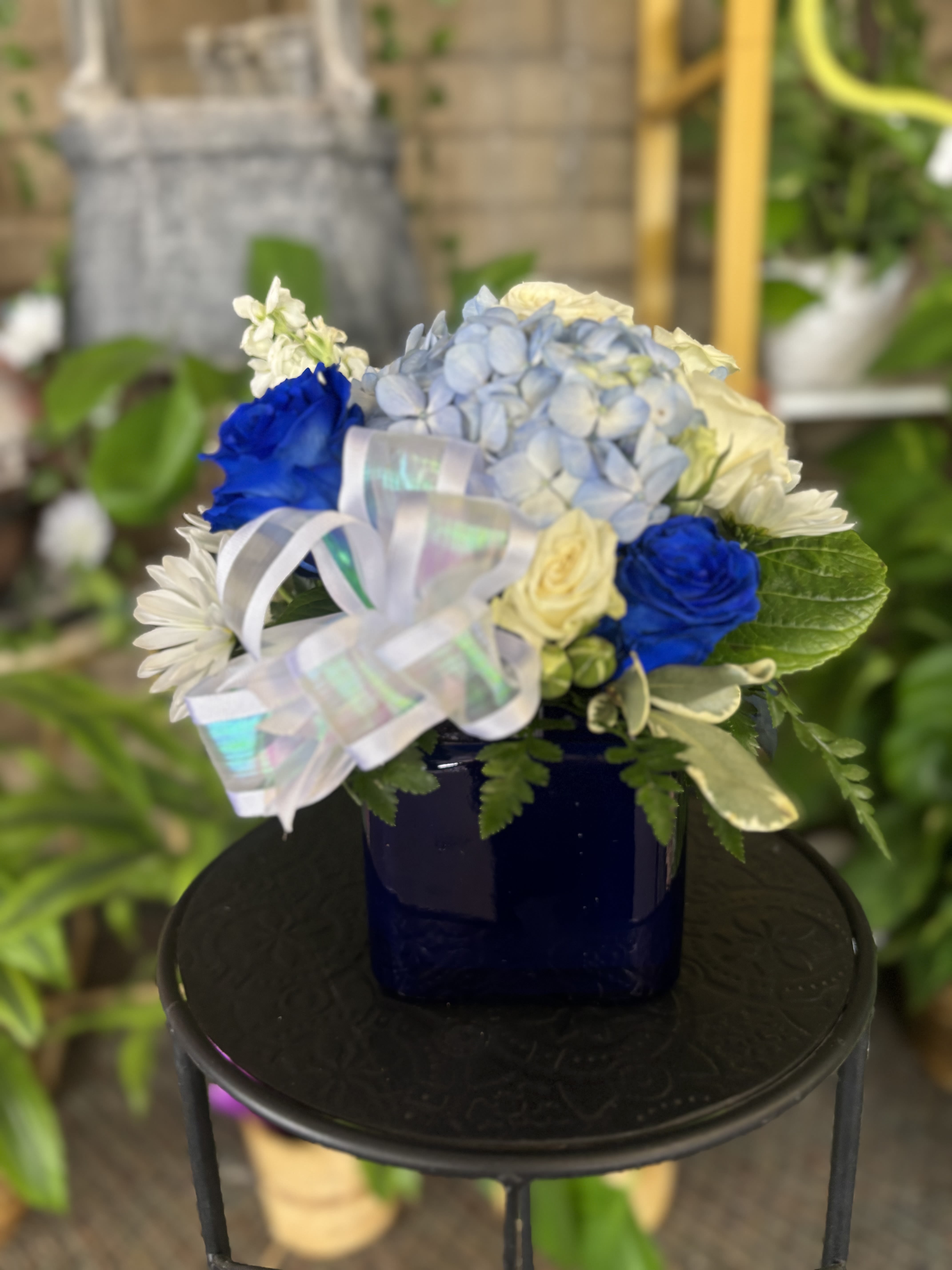 Blue Floral  - Fresh flowers in blue vase 